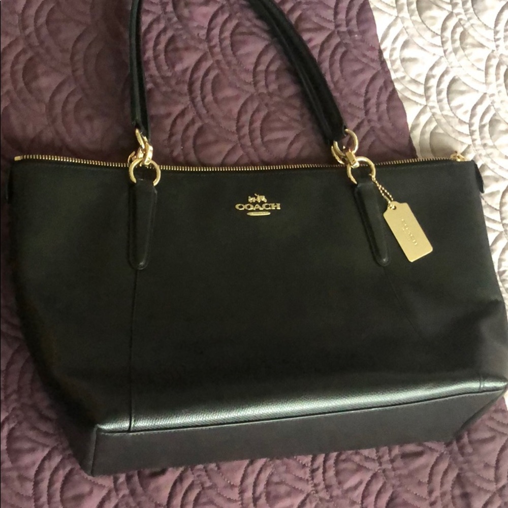 Large black leather coach tote w/ zip closure